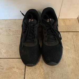 Black with gold stripe Nike sneakers